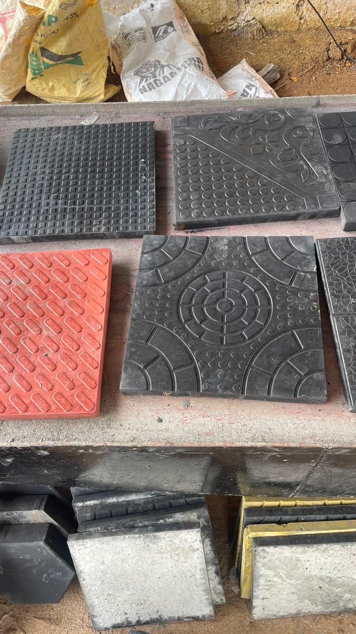 Square parking tiles with different surface designs