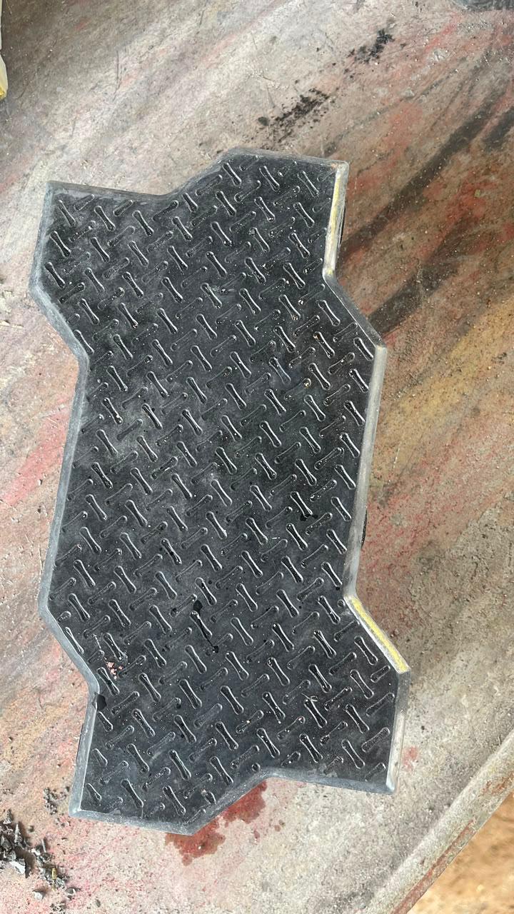 Textured fly ash parking tile surface
